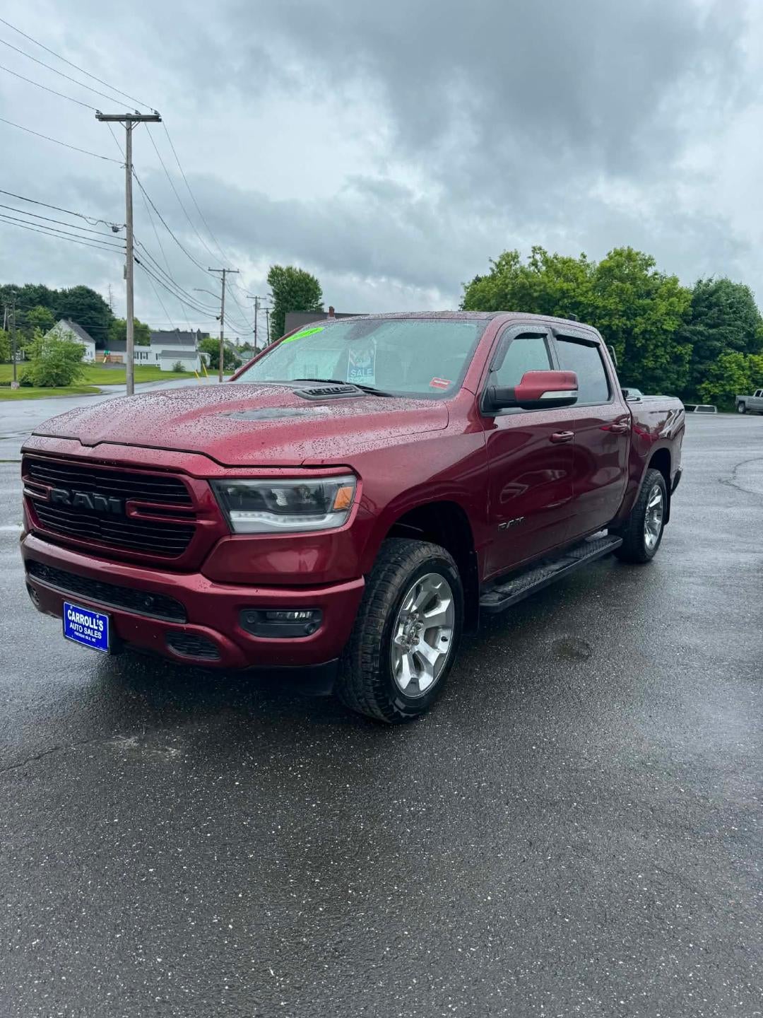 2019 RAM 1500 Rebel 4x4 Crew Cab 5'7" Box in Red — front three-quarter view
