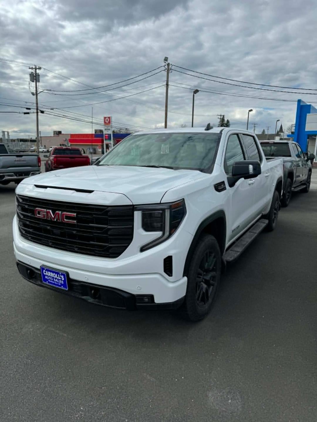 2026 GMC Sierra 1500 Elevation in Summit White — front three-quarter view