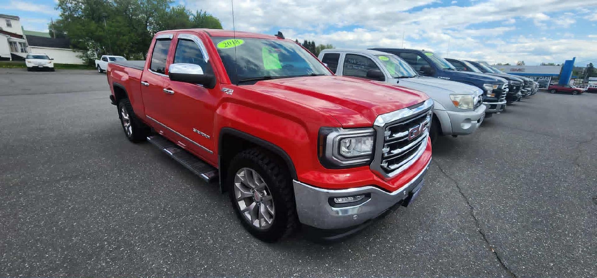 2018 GMC Sierra 1500 Double Cab Standard Box 4-Wheel Drive SLT in Cardinal Red — front three-quarter view
