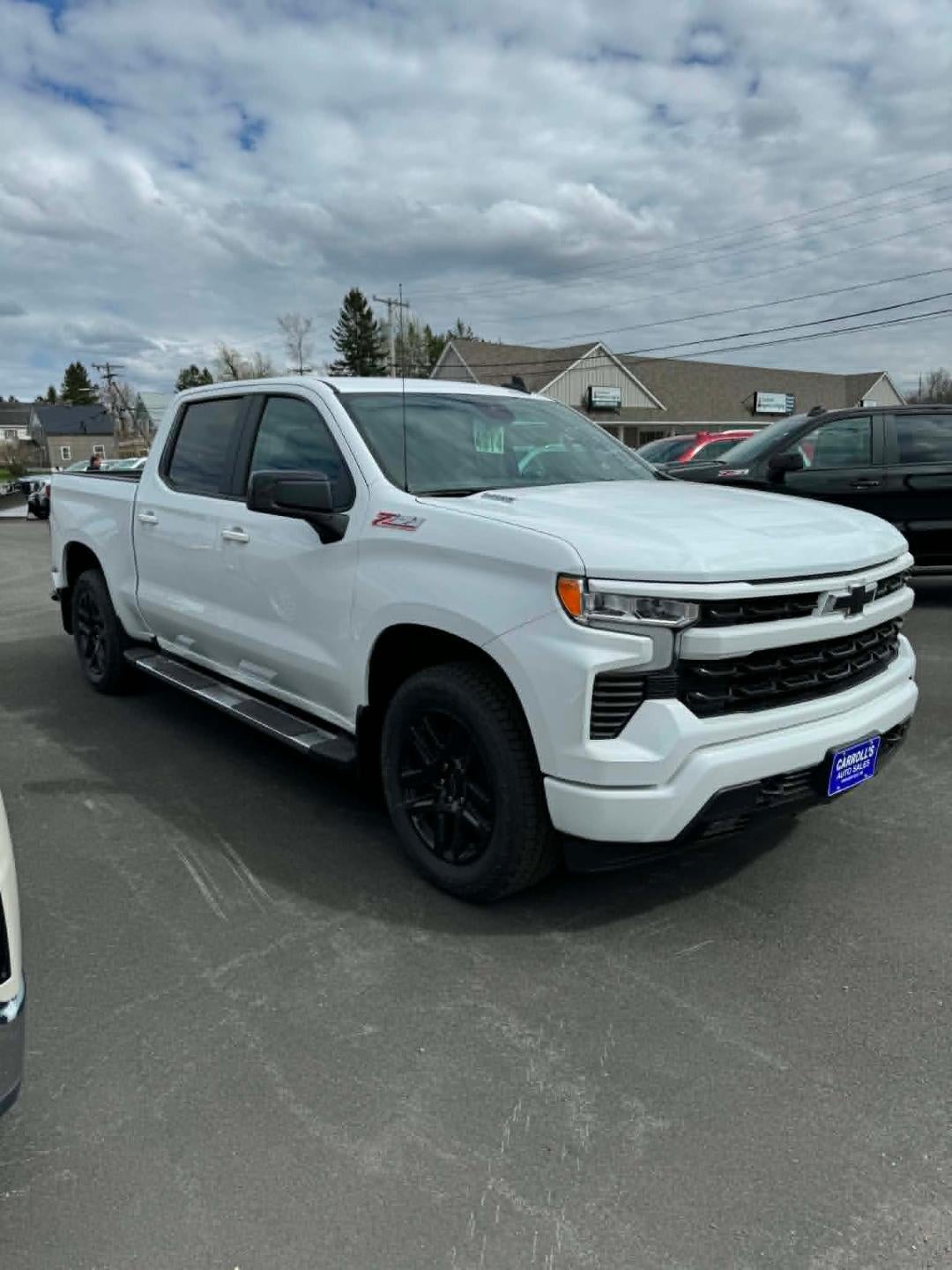 2026 Chevrolet Silverado 1500 RST in Summit White — front three-quarter view