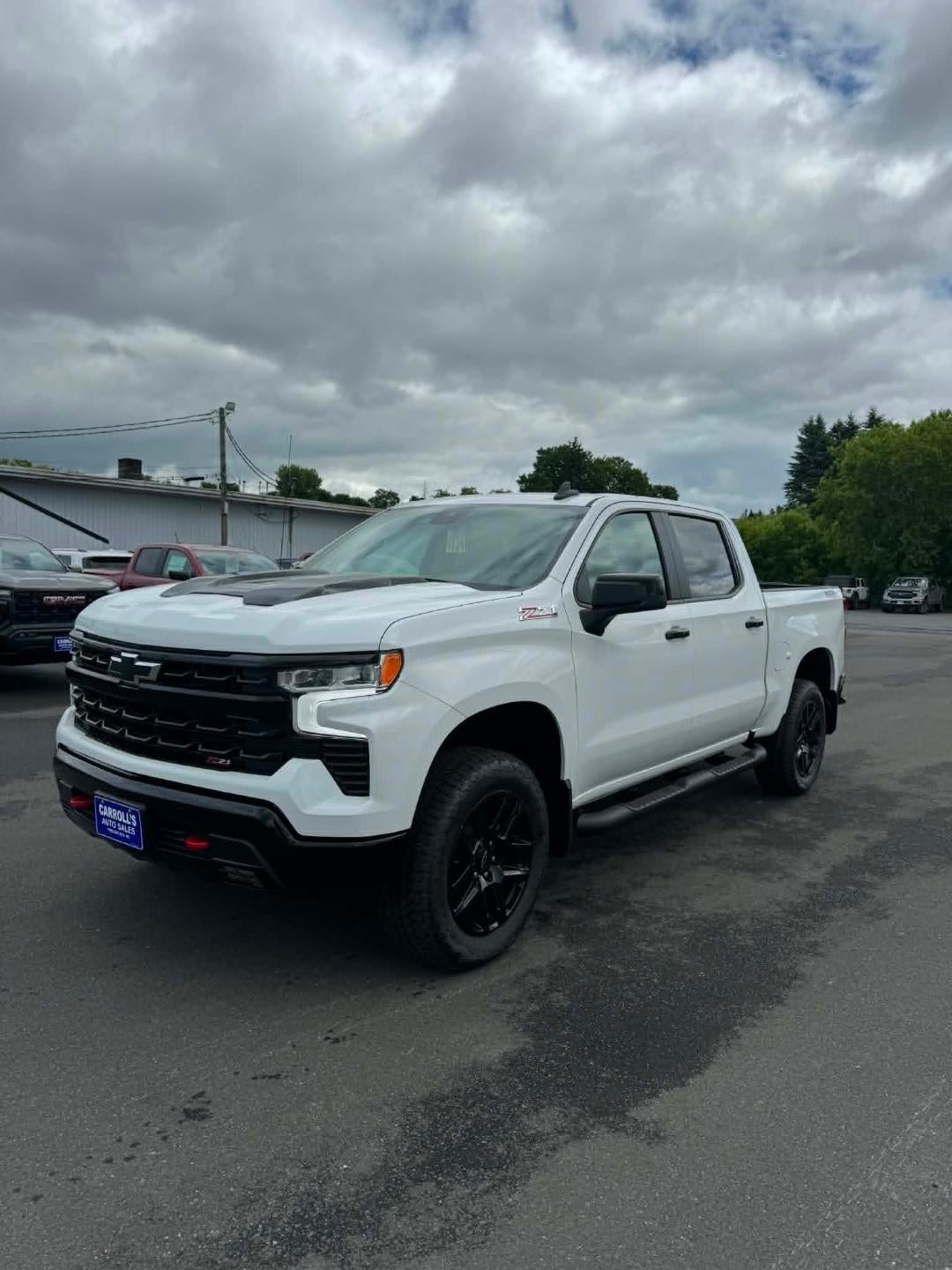 2026 Chevrolet Silverado 1500 LT Trail Boss in Summit White — front three-quarter view