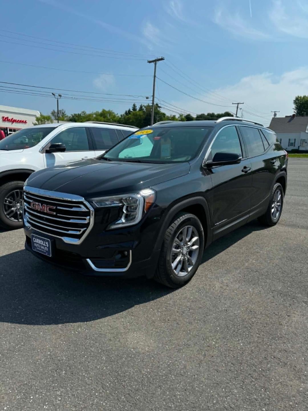 2024 GMC Terrain AWD 4dr SLT in Ebony Twilight Metallic — front three-quarter view